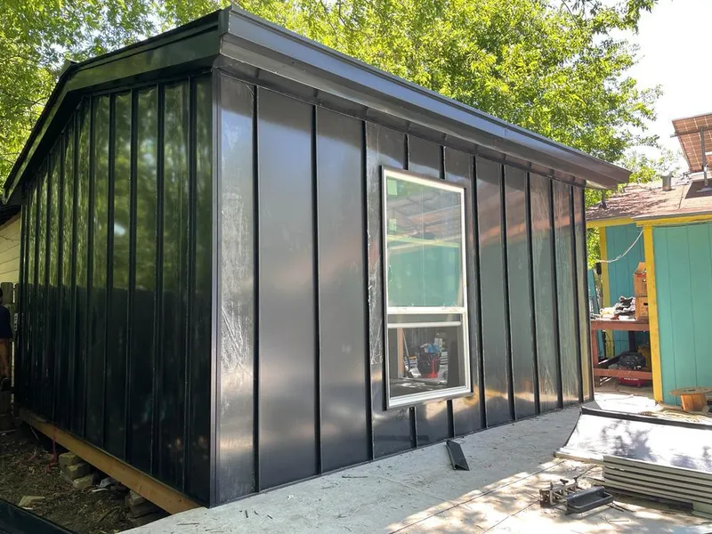 Black standing seam metal wall panels for Roof Inspection in Middle River